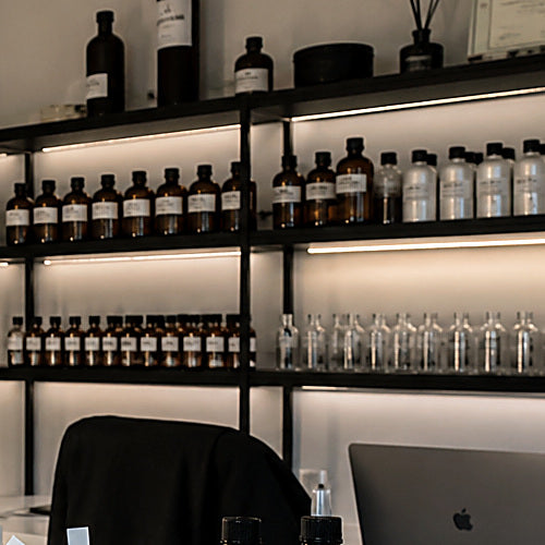 The Yevfumes studio bench with fragrance materials and blotters laid out